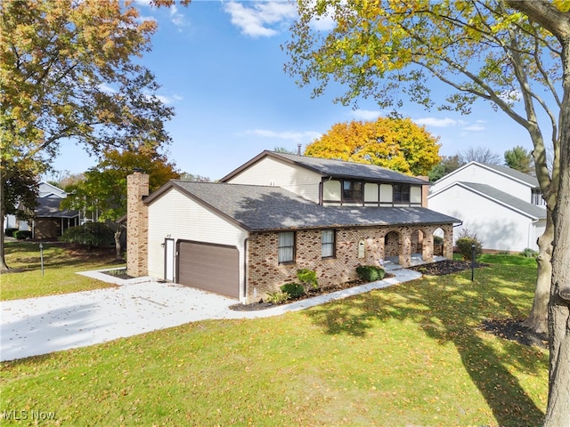 view of front of property featuring covered porch, a front lawn, and a garage