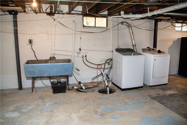 laundry area featuring washer and dryer and sink