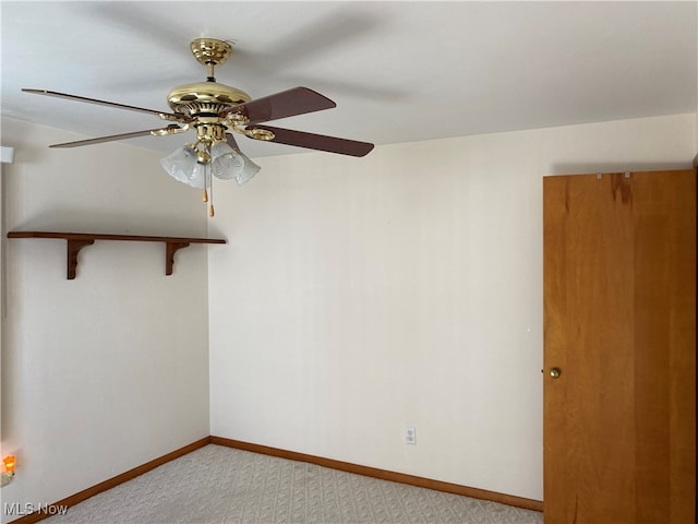 empty room with light carpet and ceiling fan