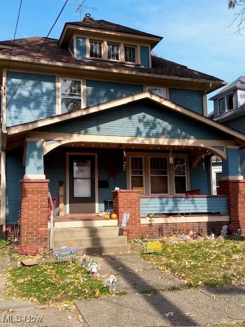 view of front of home featuring covered porch