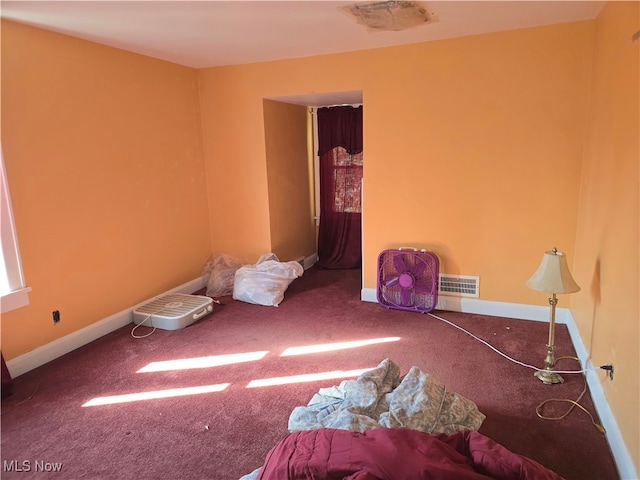 unfurnished bedroom featuring carpet flooring