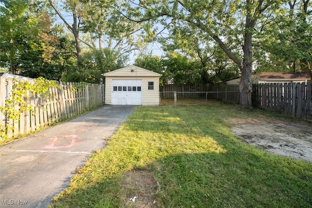 garage with a lawn