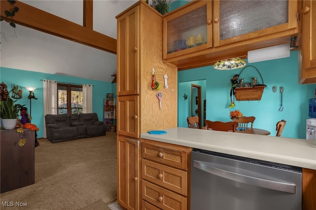 kitchen featuring carpet and dishwasher