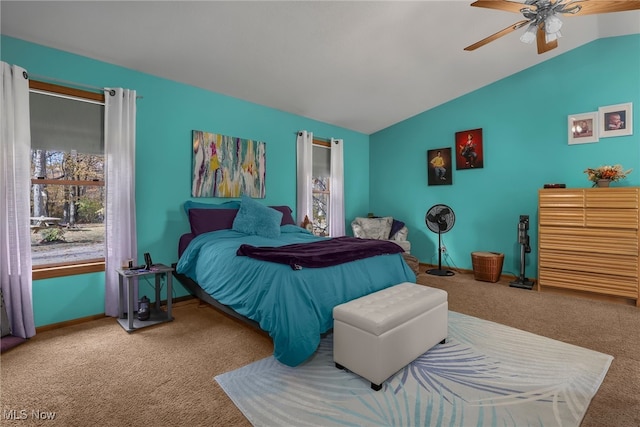 bedroom featuring lofted ceiling, carpet, and ceiling fan