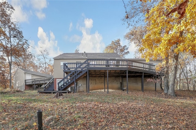 rear view of property with a deck