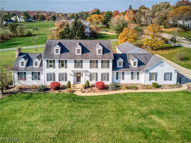 view of front of home with a front lawn