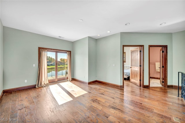 empty room with light wood-type flooring