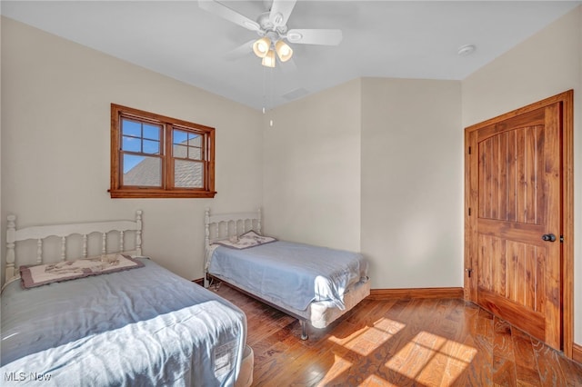 bedroom featuring light hardwood / wood-style floors and ceiling fan