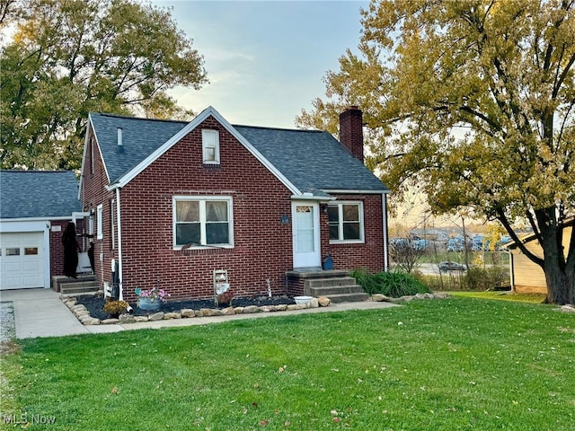 view of front facade with a front lawn and a garage