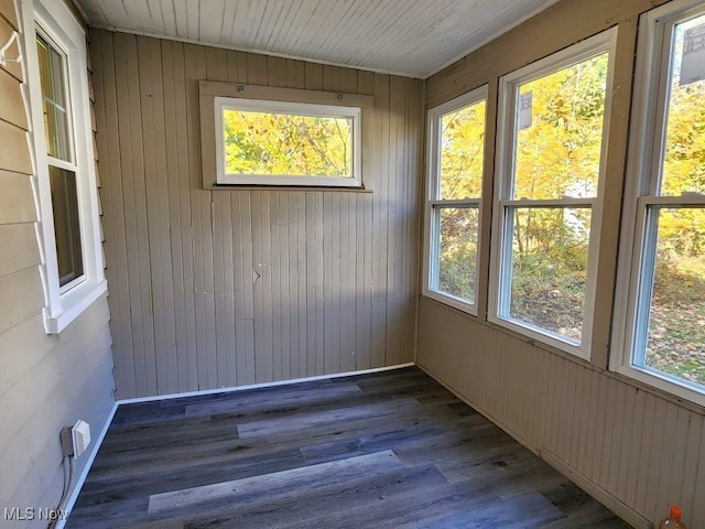 unfurnished sunroom with plenty of natural light