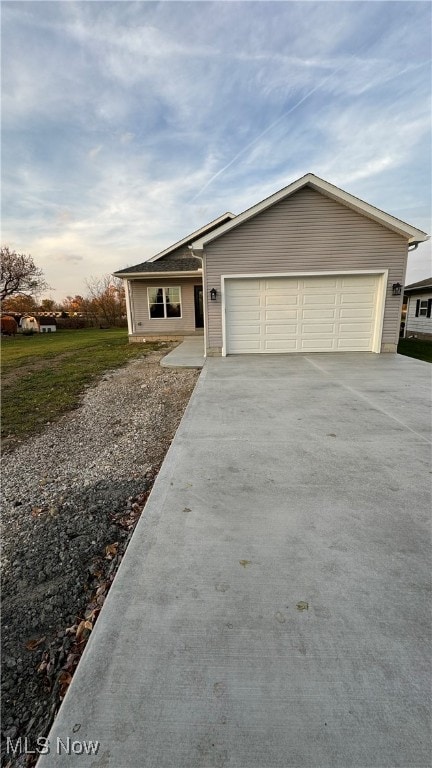 ranch-style home with a garage