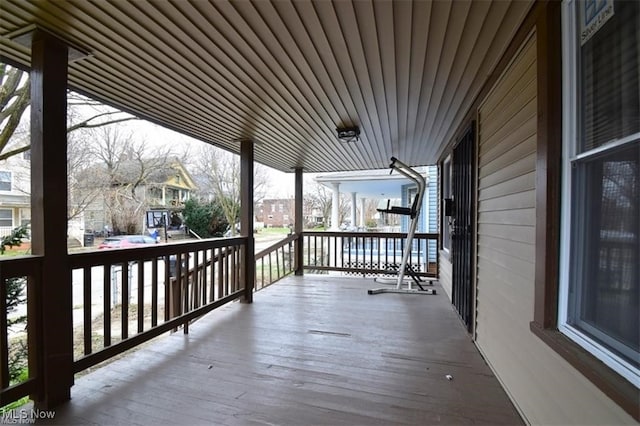 wooden terrace with covered porch