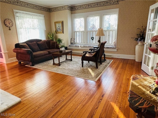 living room featuring plenty of natural light and wood-type flooring