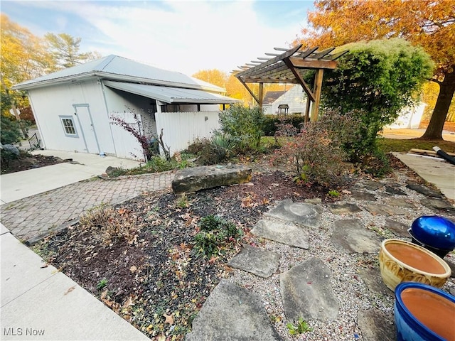 exterior space featuring a pergola