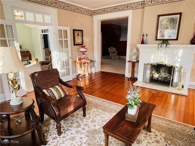 sitting room featuring hardwood / wood-style floors