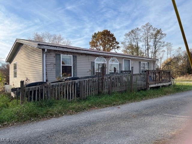 view of front of property featuring a deck