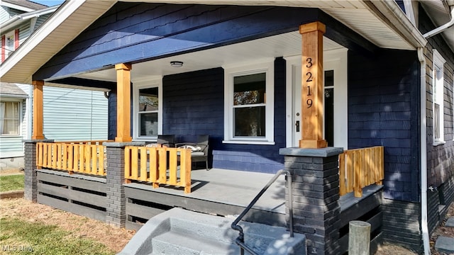 exterior space featuring covered porch