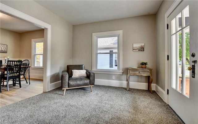 3219 11th St SW, Canton, OH 44710 - living area with carpet floors and baseboards