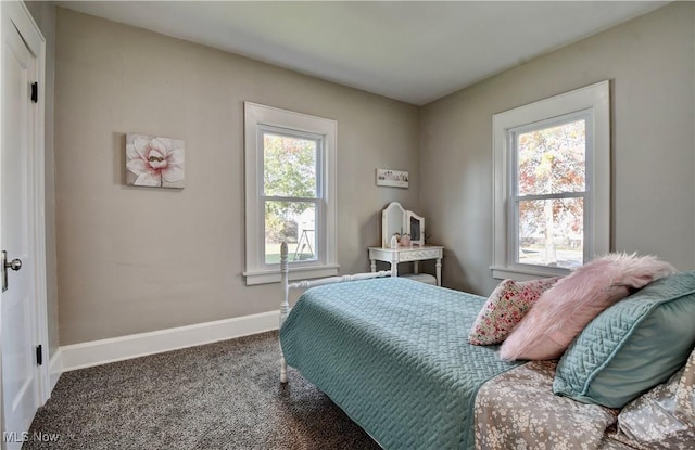 3219 11th St SW, Canton, OH 44710 - bedroom featuring carpet floors and baseboards