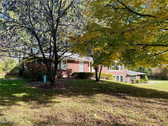 view of front of home with a front yard