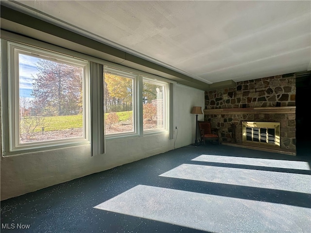 unfurnished living room with a fireplace