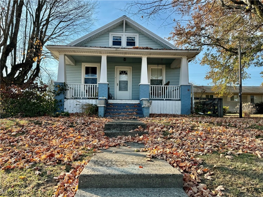 bungalow-style home with covered porch