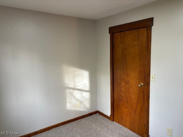 empty room with carpet floors