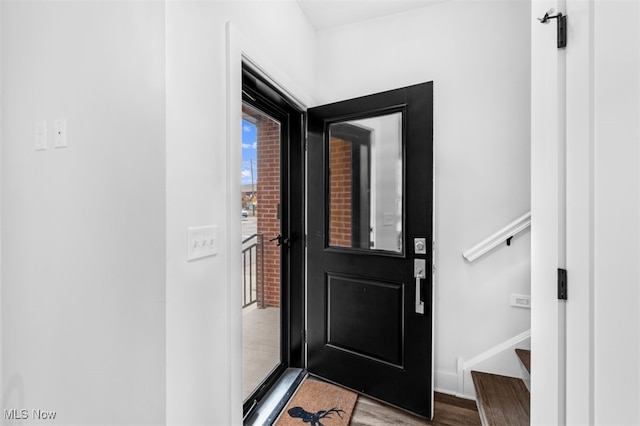 foyer with light hardwood / wood-style floors