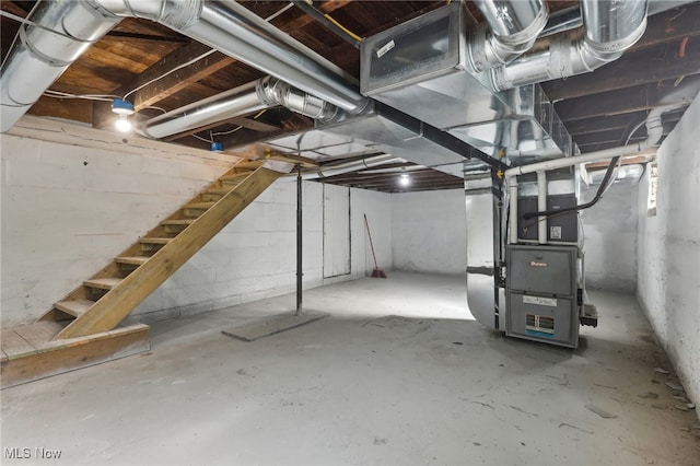 basement featuring heating unit