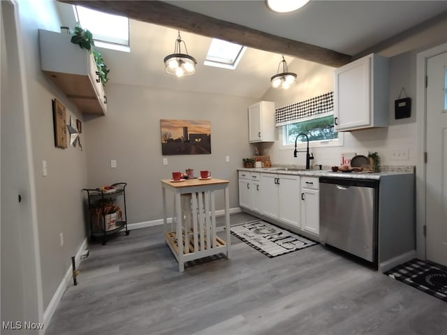 kitchen with dishwasher, white cabinets, hanging light fixtures, and sink