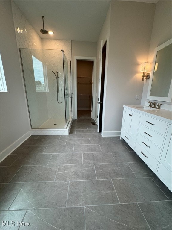 bathroom featuring vanity and walk in shower