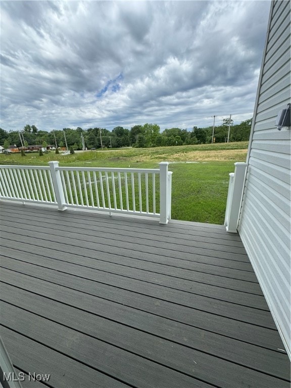 deck featuring a yard