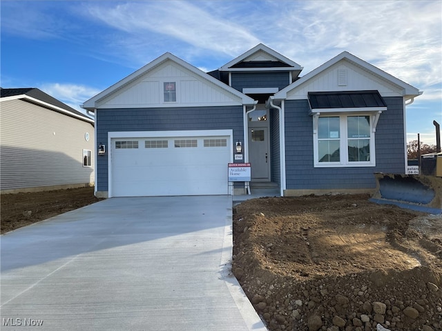 view of front of home featuring a garage