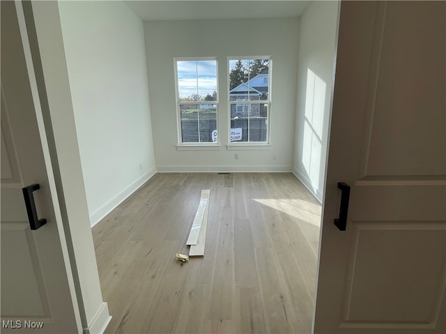 empty room featuring light hardwood / wood-style floors