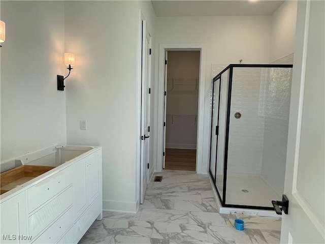 bathroom with an enclosed shower