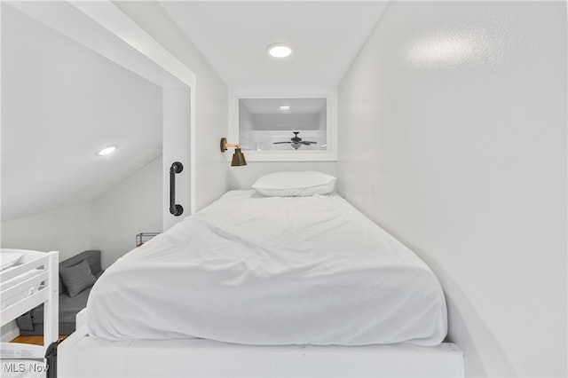 bedroom with vaulted ceiling