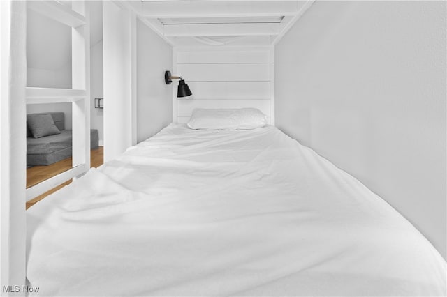 bedroom featuring wood-type flooring