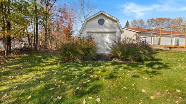 exterior space with a front yard and a garage