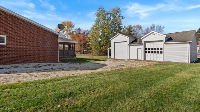 view of yard with a garage