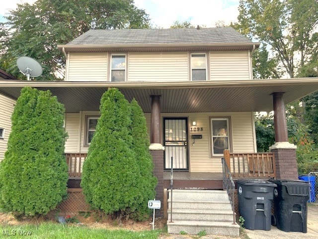 view of front property with covered porch