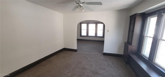 carpeted empty room with ceiling fan