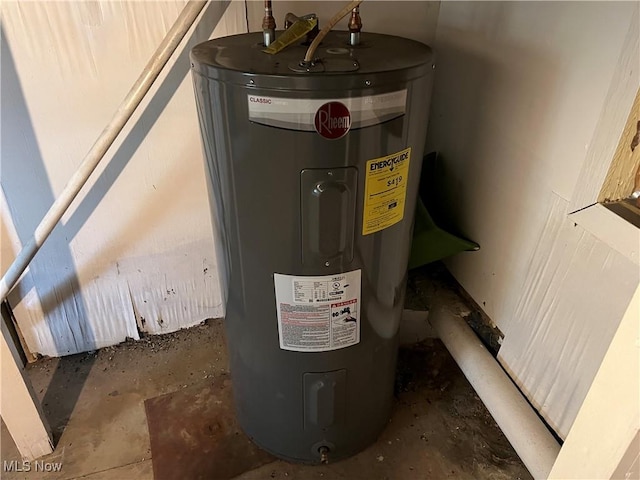 utility room featuring electric water heater