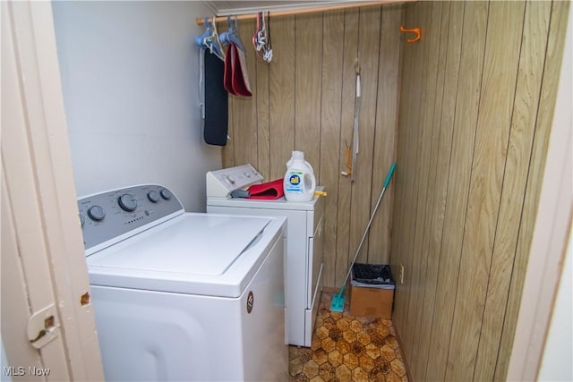 washroom featuring laundry area and washer and clothes dryer