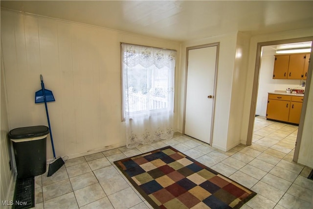 entrance foyer with light tile patterned floors