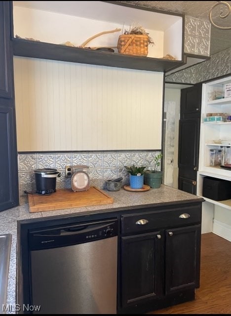 kitchen with dishwasher, blue cabinets, and dark wood-type flooring