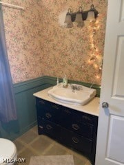 bathroom with vanity and toilet