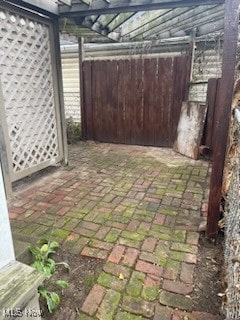 view of yard with a pergola and a patio area