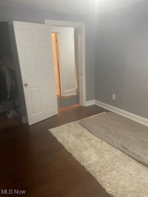 interior space featuring dark wood-type flooring