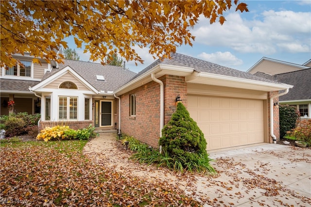 single story home featuring a garage