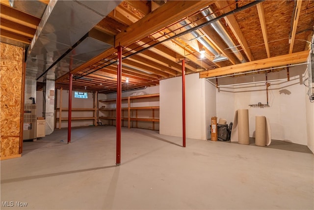 basement featuring heating unit